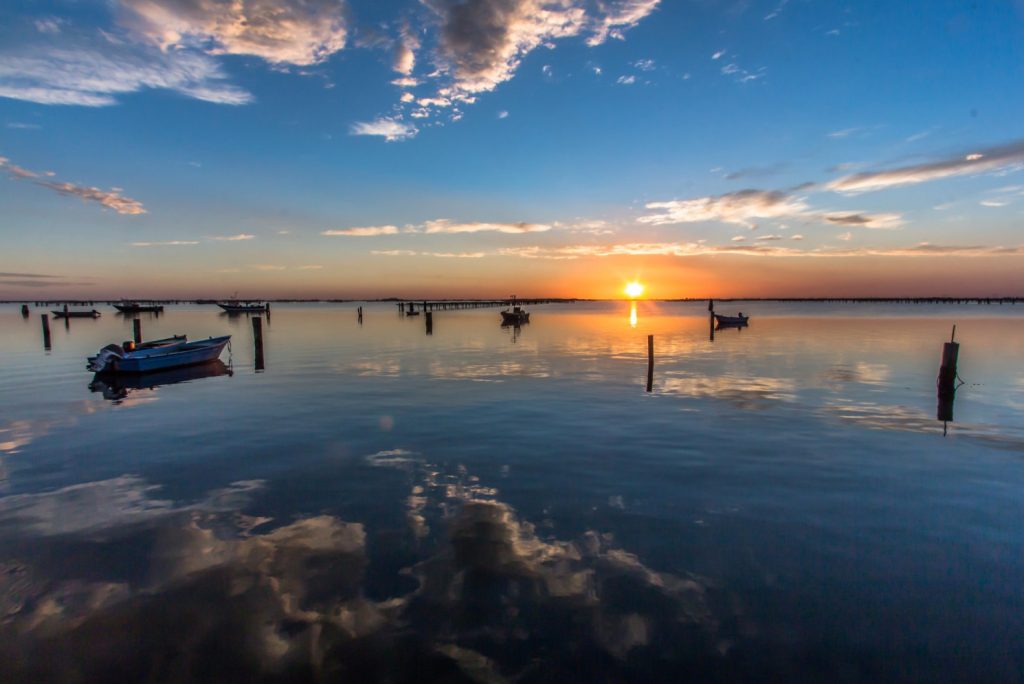 Scenic sunset view over the sea – beautiful coastal landscape at Rosolina Mare